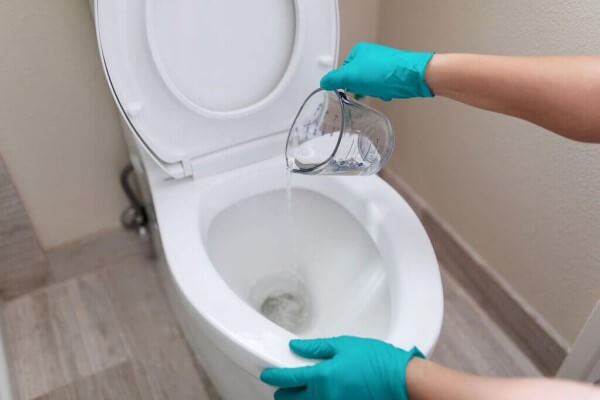 hot water can help unblock a toilet