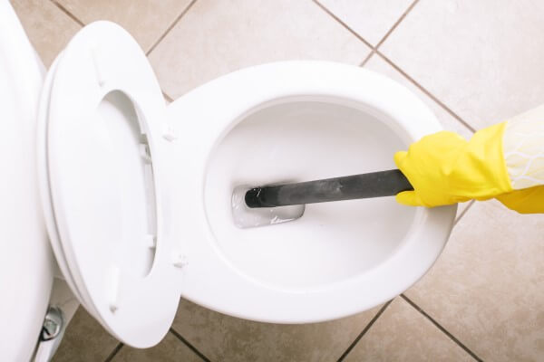 Wet vacuuming a blocked toilet